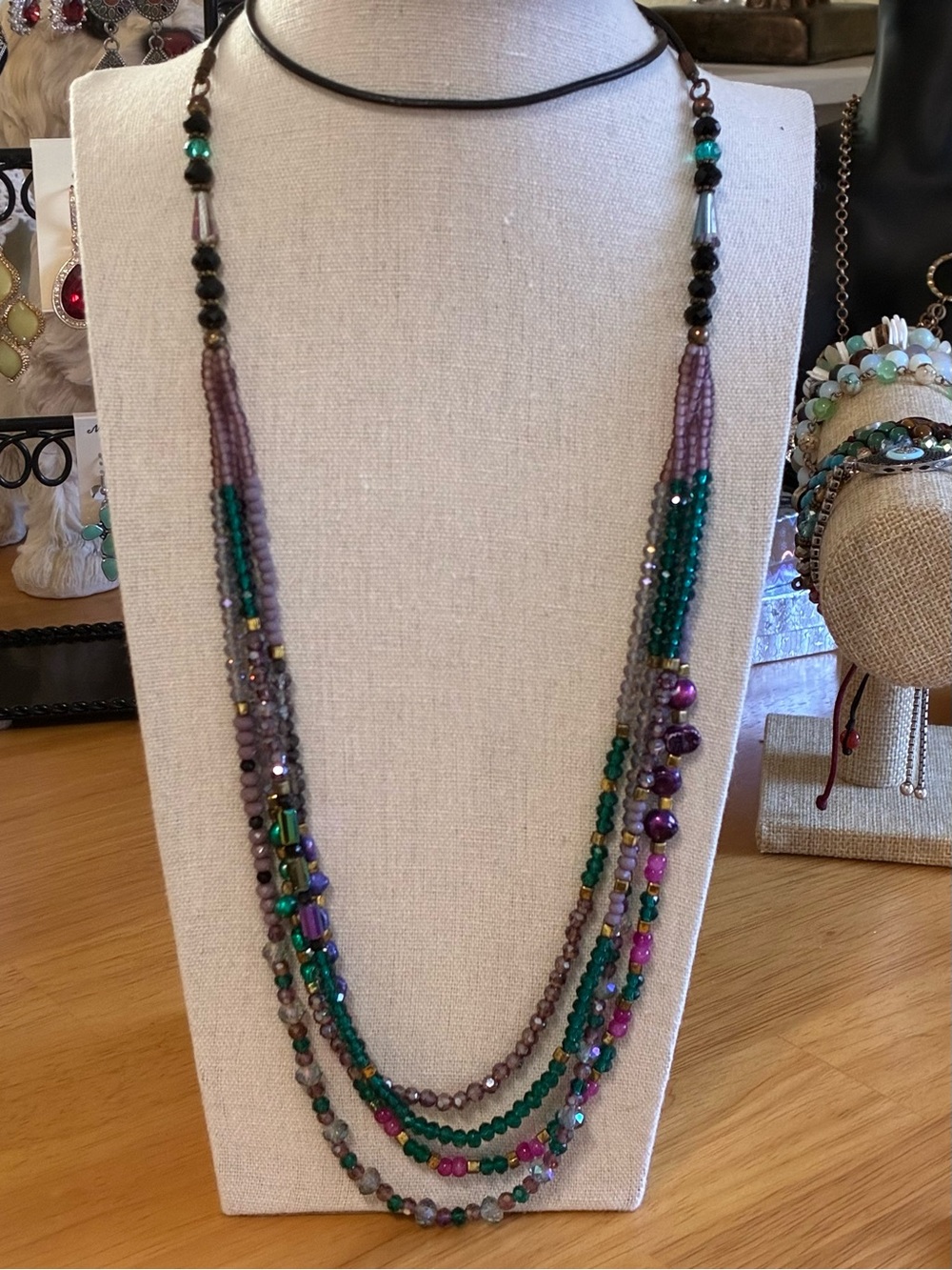 A vibrant multi-strand bohemian beaded necklace.